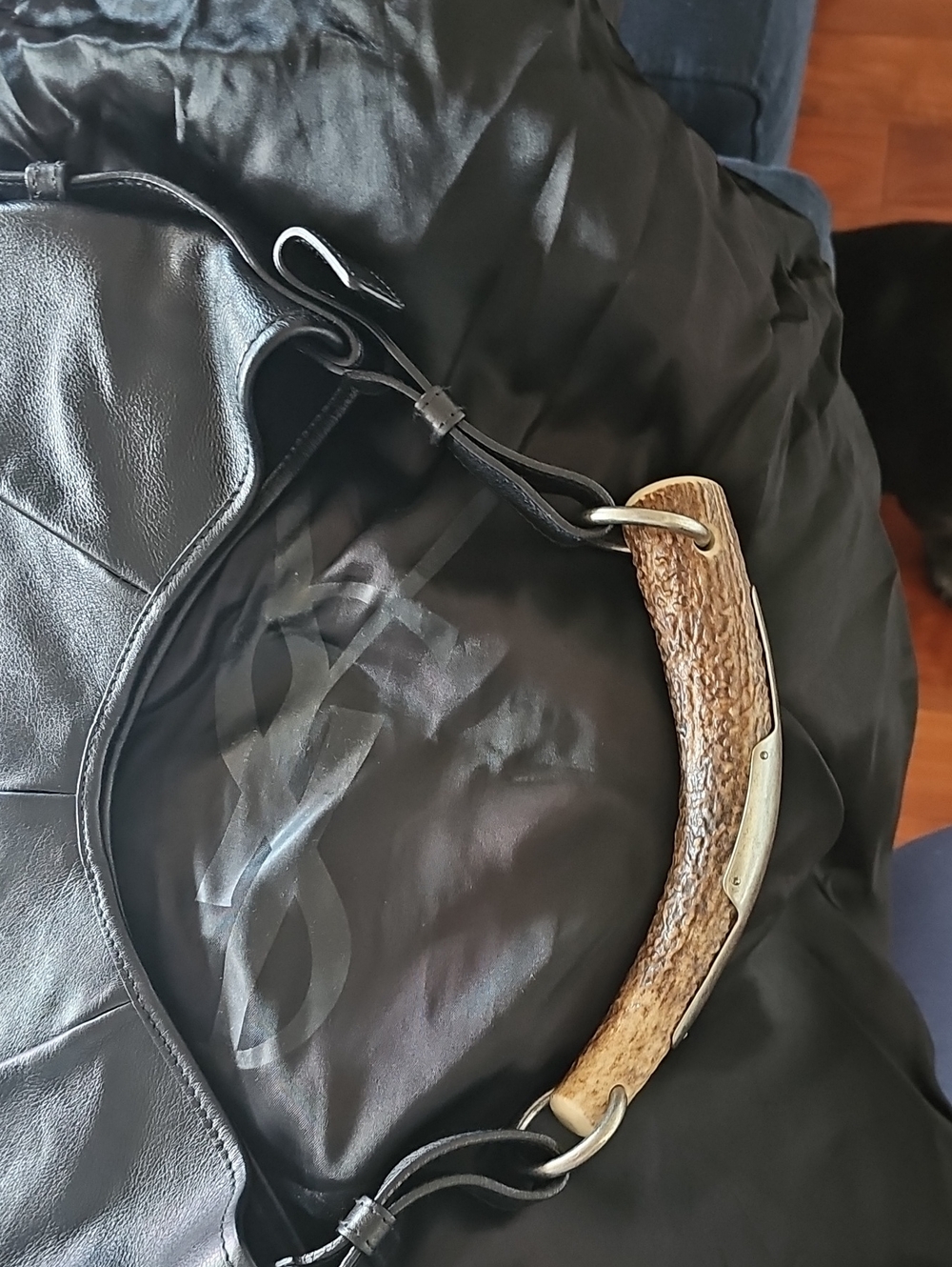 Black Leather Messenger Bag with Natural Antler-Style Handle Accent